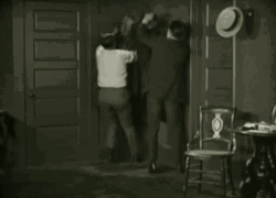 Hiding In The Coat GIF