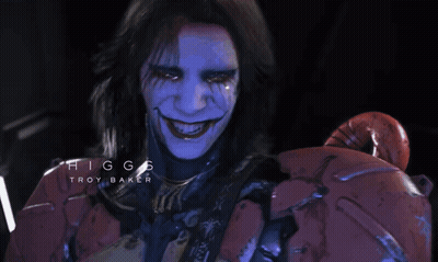 Higgs Troy Baker Is The Name Displayed On The Face Of A Person GIF