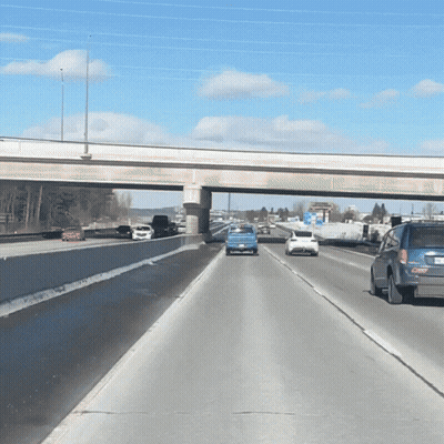 Highway Cars Under Bridge Sorry Sign GIF