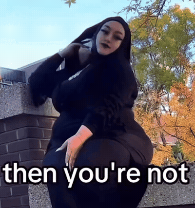 Hijabi Woman On Wall Says Then You're Not GIF