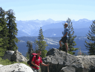 Hiking Buddies Standing On Peak GIF