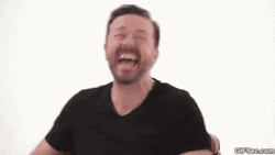 Hilarious Laughing Ricky Gervais GIF