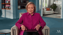 Hillary Clinton Opening Book For Her Speech GIF