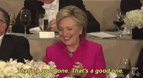 Hillary Clinton Sitting In A Table GIF