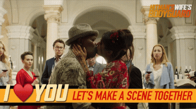 Hitman's Wife's Bodyguard Poster Couple Kissing GIF