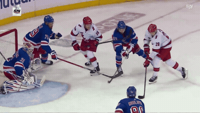 Hockey Game Being Played GIF