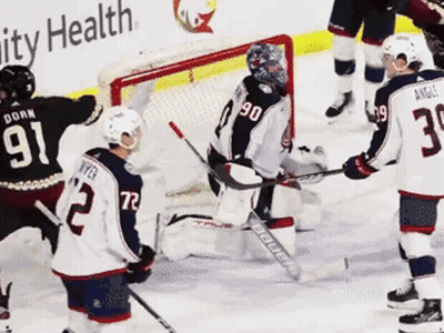 Hockey Game In Front Of Ability Health Sign GIF
