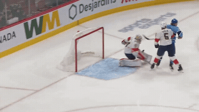 Hockey Game In Front Of Air Canada Banner GIF