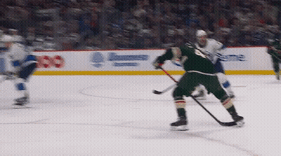 Hockey Game In Front Of Airways Banner GIF