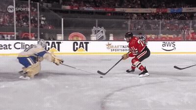 Hockey Game In Front Of AWS Ad GIF