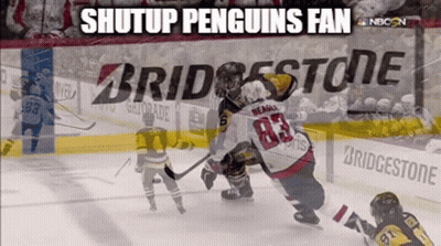 Hockey Game In Front Of Bridgestone Sign GIF