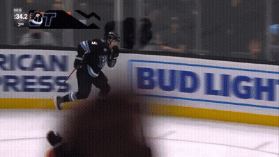 Hockey Game In Front Of Bud Light Sign GIF