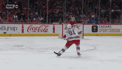 Hockey Game In Front Of Caesars Sportsbook Sign GIF