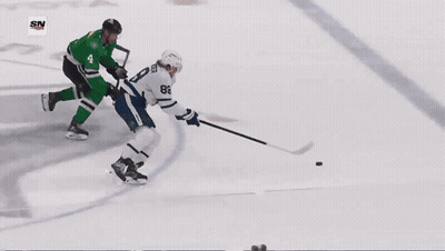 Hockey Game In Front Of Children's Hospital Banner GIF