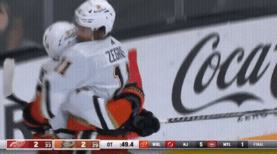 Hockey Game In Front Of Coca Cola Ad GIF