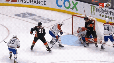 Hockey Game In Front Of Cox Ad GIF