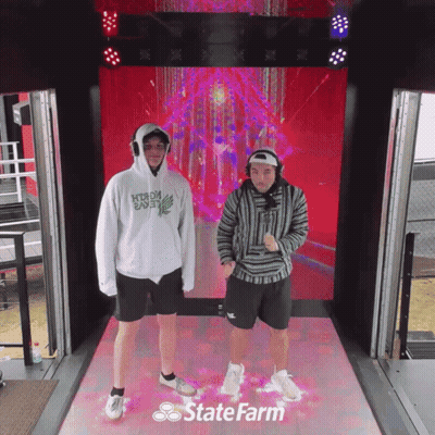 Hockey Game In Front Of Divsal Sign GIF