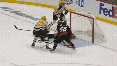 Hockey Game In Front Of FedEx Banner GIF