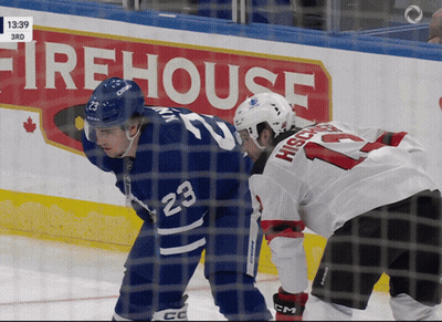 Hockey Game In Front Of Firehouse Ad GIF