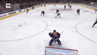 Hockey Game In Front Of Gatorade Sign GIF