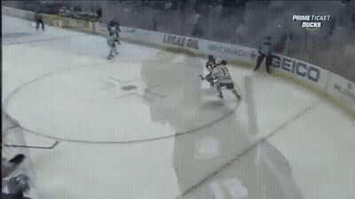 Hockey Game In Front Of Geico Banner GIF