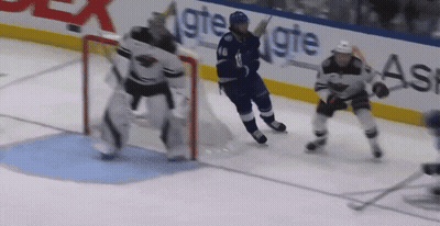 Hockey Game In Front Of GTE Sign GIF