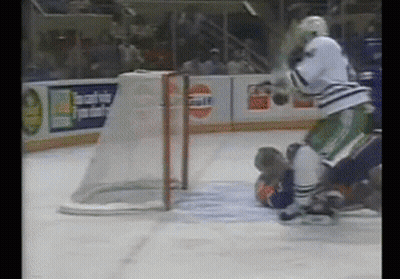 Hockey Game In Front Of Gulf Sign GIF