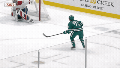 Hockey Game In Front Of Habbas Law Ad GIF