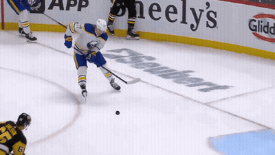 Hockey Game In Front Of Heely's Sign GIF