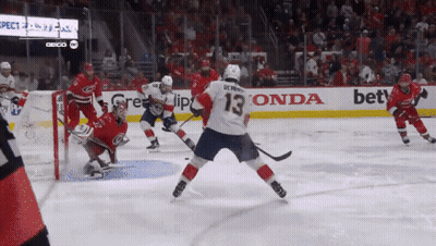 Hockey Game In Front Of Honda Advertisement GIF