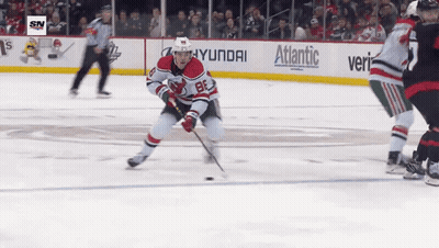 Hockey Game in Front of Hyundai Banner