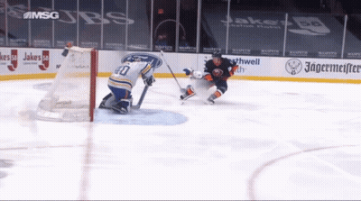 Hockey Game In Front Of Jagermeister Sign GIF
