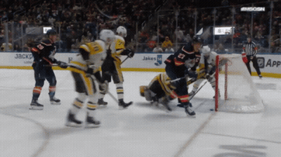 Hockey Game In Front Of Jakes Sign GIF
