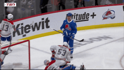 Hockey Game In Front Of Kiewit Sign GIF