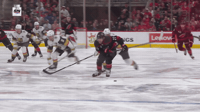 Hockey Game In Front Of Lenovo Advertisement GIF