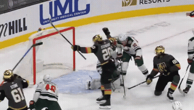 Hockey Game In Front Of Limc Ad GIF