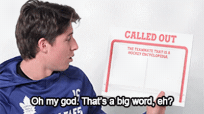 Hockey Game In Front Of Little Caesars Ad GIF