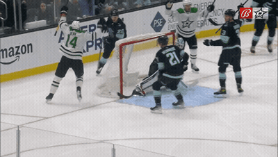 Hockey Game In Front Of Mazon Banner GIF