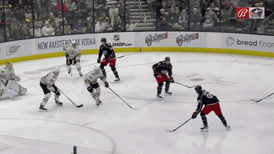 Hockey Game In Front Of New Amsterdam Vodka Shop Banner GIF