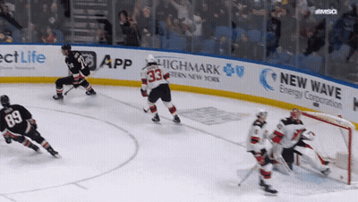 Hockey Game In Front Of New Wave Banner GIF