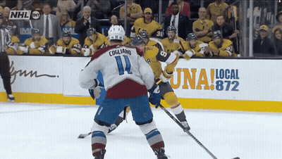 Hockey Game In Front Of NHL Advertisement GIF