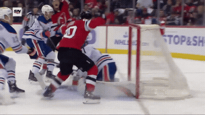Hockey Game In Front Of NHL Banner GIF