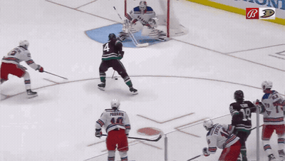 Hockey Game In Front Of Park West Sign GIF