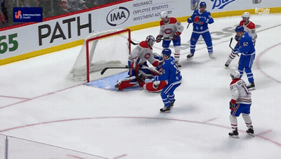 Hockey Game In Front Of Path 65 Banner GIF