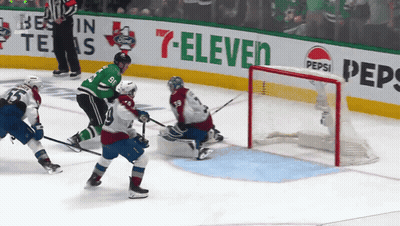 Hockey Game In Front Of Pepsi Advertisement GIF