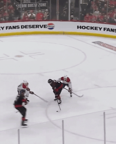 Hockey Game In Front Of Pepsi Banner GIF