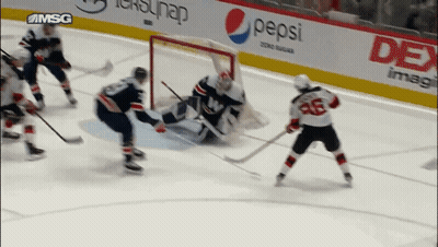 Hockey Game In Front Of Pepsi Sign GIF