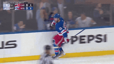 Hockey Game In Front Of Pepsi Sign GIF