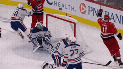 Hockey Game In Front Of PNB Bank Ad GIF