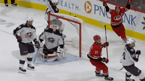 Hockey Game In Front Of PNC Bank Ad GIF